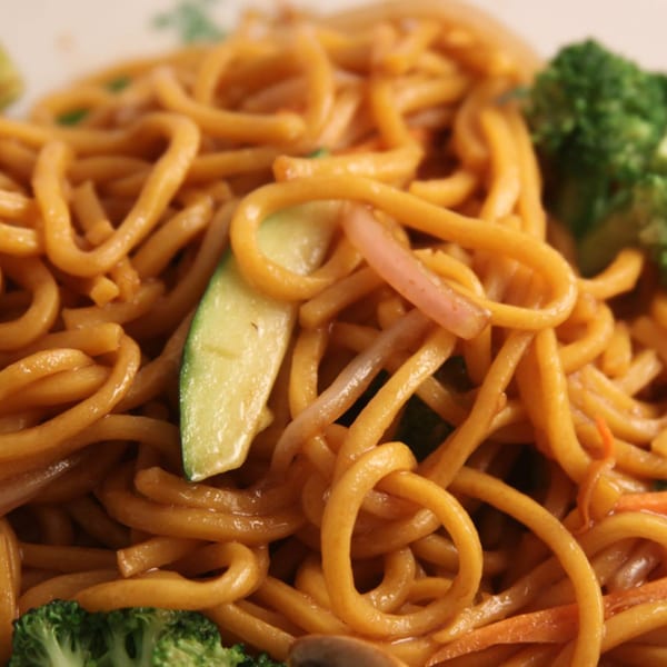 Close-up of Fulin's Asian Cuisine's lo mein noodles with broccoli, zucchini, and onions.